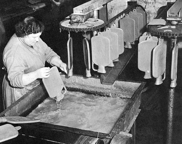Hot water bottles in production, 1900